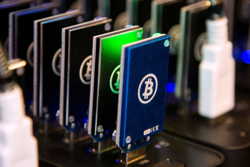 FILE PHOTO: Chain of block erupters used for Bitcoin mining is pictured at the Plug and Play Tech Center in Sunnyvale, California