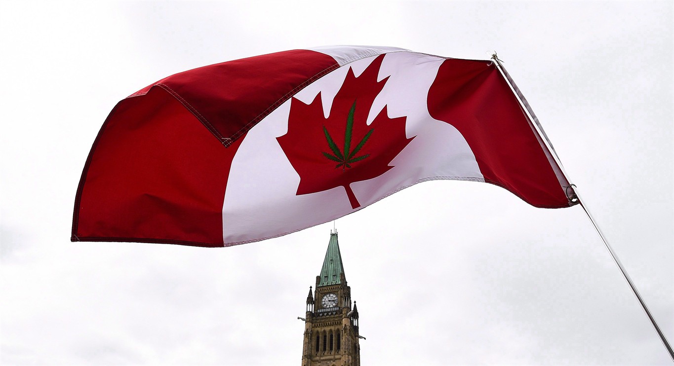 A Canadian flag with a marijuana leaf